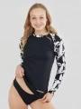 Fundango Joyce Long Sleeve Rashguard for women in black 1